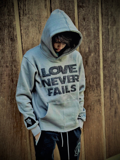 "Love Never Fails" Grey Hoodie