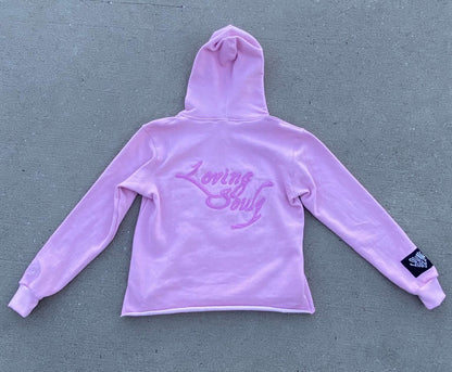 "Love Never Fails" Pink Hoodie